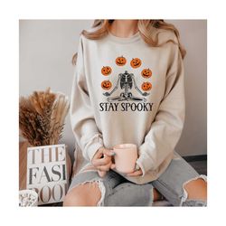 unisex stay spooky skeleton sweatshirt, halloween sweatshirt,witch shirt, retro fall shirt, spooky season shirt,funny ha