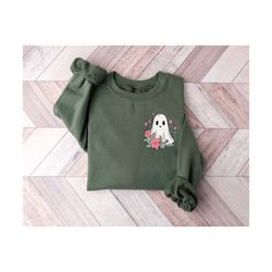 flower ghost pocket size halloween sweatshirt, spooky ghost halloween shirt, groovy floral ghost sweatshirt, spooky hall