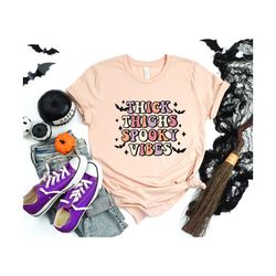 thick thighs and spooky vibes shirt,funny halloween shirt,spooky vibes sweatshirt,halloween party shirt, halloween tshir