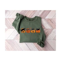 black cat pumpkin halloween sweatshirt,cool halloween cat shirt,cat lover tshirt,black cat shirt,spooky season,cat sweat