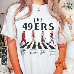 49ers walking abbey road signatures football shirt, kyle shanahan sweatshirt, brock purdy, nick bosa, christian mccaffre