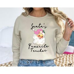 santa's favorite teacher sweatshirt, retro pink santa hat hoodie, classic christmas santa, vintage santa graphic sweatsh