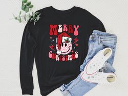 merry christmas sweatshirt, leopard smiley face with santa hat sweatshirt, christmas vibes hoodie, smiley face christmas