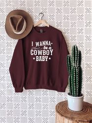 i wanna be a cowboy babe sweatshirt,cowboy sweatshirt,country sweatshirt,southern tee,western sweatshirt,cowboy gift,cow