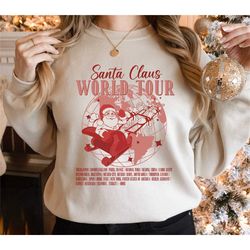 santa claus world tour sweatshirt, retro christmas santa t-shirt, santa claus sweater, santa claus riding sleigh shirt,