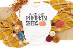 don't eat pumpkin seeds shirt, pumpkin pregnancy shirt, pregnancy announcement, fall maternity shirt, funny maternity sh
