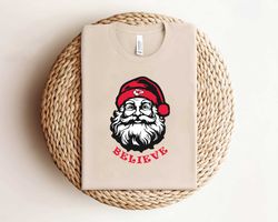 santa claus believe kansas city football shirt