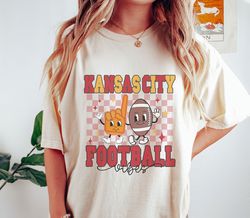 american football shirt, vintage sunday game day tee, trendy sports fan gift, graphic football lover t-shirt, aesthetic