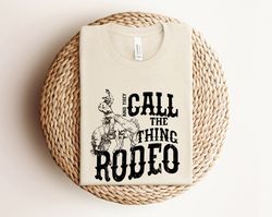 and they call the thing rodeo shirt, saddle up buttercup shirt, rodeo shirt, cowboy shirt, cowgirl shirt, western shirt,