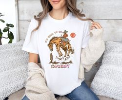 it's cool to be cowboy shirt, western graphic tee, western trendy tee, women's western v-neck shirt, concert graphic tee