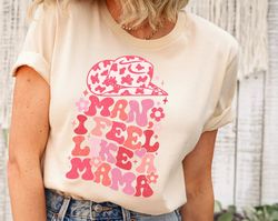 man i feel like a mama western graphic tee, baby announcement shirt for mom, baby reveal mama shirt, western mama retro