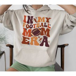 in my football mom era hoodie, mama football sweatshirt, game day football shirt, sport mama sweater, mama high school f