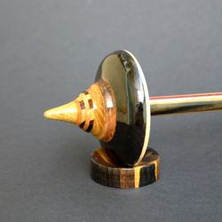 wooden supported spindle with cup