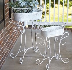 set of two scrolled metal planters