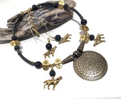 ancient style choker necklace with brass pendant and long earrings with wolf charms
