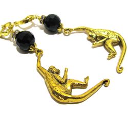 long earrings with big black agate beads and golden monkey charms