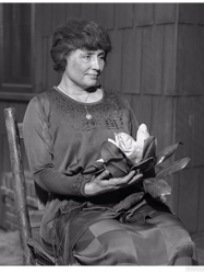 helen keller holding a magnolia flower 1920s vintage photograph