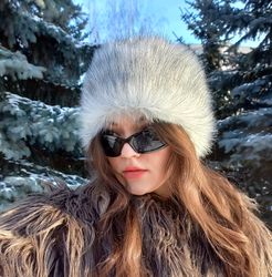 arctic fox hat made of faux fur. furry hat in russian style. gray white fluffy hat. cute fuzzy winter hat. slavic girl.