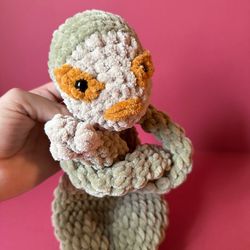 crocheted sloth toy - sleepy snuggler for baby