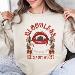 astarion bloodless shirt, bloodless shirt, astarion sweatshirt, astarion candle, astarion merch shirt