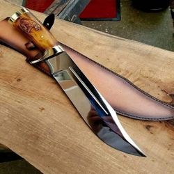 steel bowie knife with engraved bone handle with leather sheath...hand made high polish viking collectibles  beautiful.