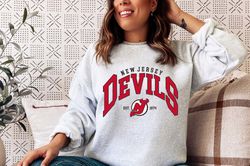 new jersey devils sweatshirt, nj hockey shirt, vintage ice hockey tee, jersey devils hoodie, 2022-23 new jersey devils