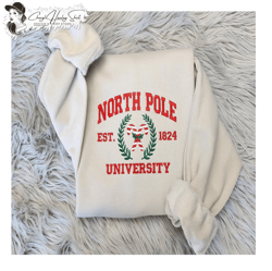 embroidered north pole university sweatshirt - north pole - candy canes - funny santa unisex crewneck sweatshirt or hood
