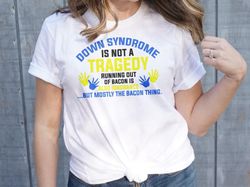 down syndrome awareness svg png, down syndrome is not a tragedy running out of bacon svg, blue yellow ribbon svg, world