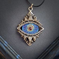 third eye necklace, symbol, amulet, necklace with garnet, wire wrapped necklace, titanium jewelry, esoteric necklace