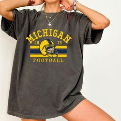 michigan football tshirt, wolverines football fan gear, jim harbaugh, sign stealing,college team