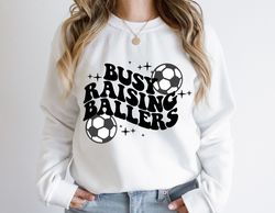 busy raising ballers sweatshirt,busy raising ballers shirt,baseball mama shirt,trendy baseball shirt,game day shirt rais