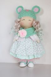 handmade textile doll in a mint-pink dress
