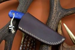 a very beautiful handmade damascus steel skinner knife,,,