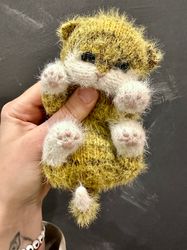 knitted toy realistic yellow kitten in stock