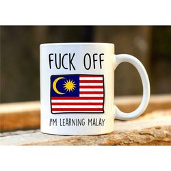 fuck off i'm learning malay. malaysia mug. rude mug. malay gift. funny melayu mugs. malay student. profanity gift. 1