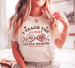 i teach the cutest little hearts shirt, groovy valentines day teacher tee, retro candy heart students shirt, back to sch