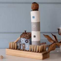 lighthouse and lighthouse keeper's house from driftwood in a nautical style, original interior decor and a holiday gift