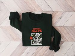 embroidered staying alive coffee sweatshirt, trendy sweatshirt, spooky season crewneck trendy coffee sweatshirt, hallowe