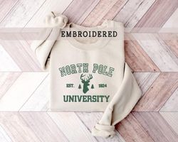 embroidered the north pole sweatshirt, christmas crewneck, christmas apparel, xmas gift, holiday crewneck, north pole un