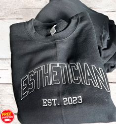 personalized embroidered esthetician sweatshirt with name on sleeve, makes the perfect gift for esthetician graduation,