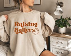 basketball mom shirt raising baller, basketball crewneck for mom, basketball mom crewneck game day basketball mom tee