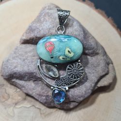 blue pendant.