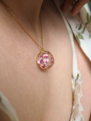 pressed pink gypsophila flower necklace, gold stainless steel necklace