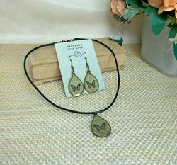 Handmade jewelry set. Shiny butterflies in a bronze frame. designer jewelry.