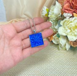 Bright blue 3D handmade pendant.
