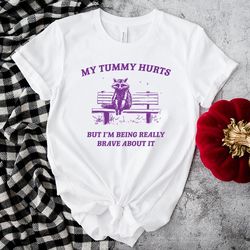 my tummy hurts raccoon meme shirt