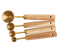 gold metal and wood nesting measuring spoons