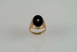 yellow gold ring with black onyx and diamond stone