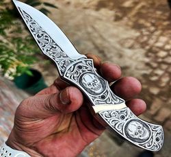 handmade engraving pocket knife with skull heads..!!!!!!