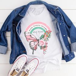 with brave wings she flies tee